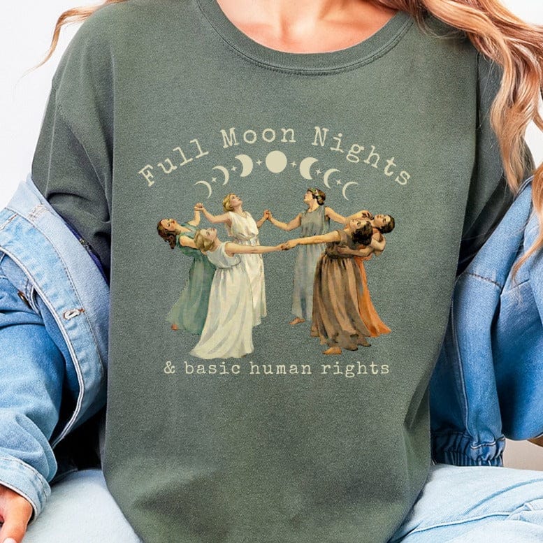Women in dresses dancing in a circle with text "Full Moon Nights & basic human rights".