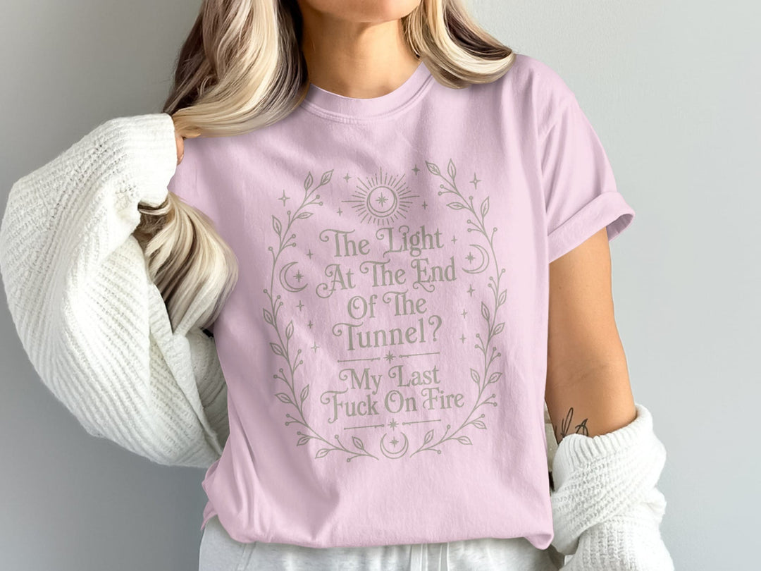 Pink t-shirt with "The Light At The End Of The Tunnel? My Last Fuck On Fire" text.