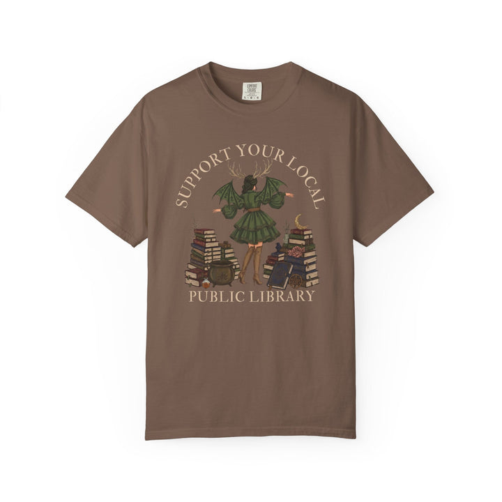Brown t-shirt with "Support Your Local Public Library" text and fantasy art.