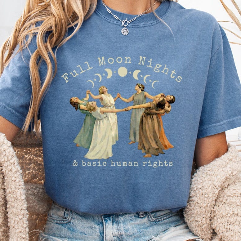 T-shirt with women dancing under moon and stars, text "Full Moon Nights & basic human rights".