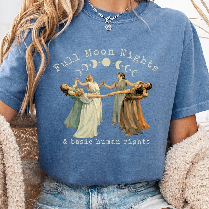 T-shirt with women dancing under moon and stars, text "Full Moon Nights & basic human rights".