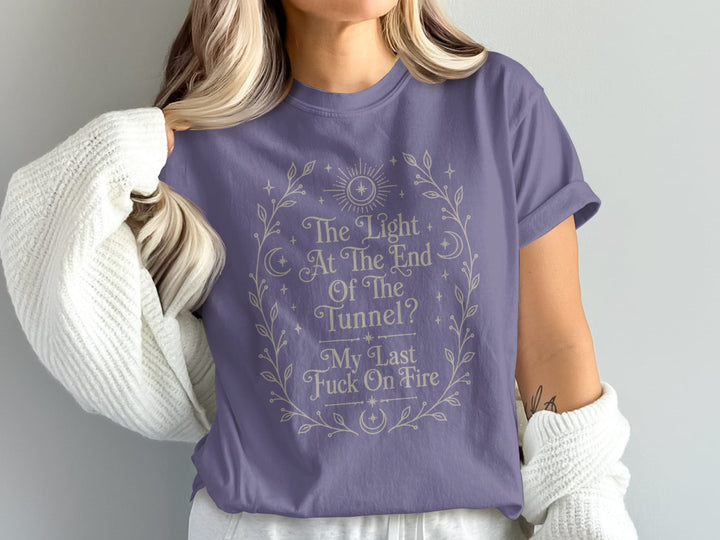 Purple t-shirt with text "The Light At The End Of The Tunnel? My Last Fuck On Fire".