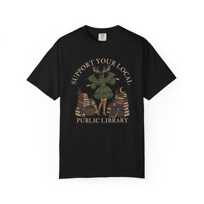 Black t-shirt with "Support Your Local Public Library" text and mystical illustrations.