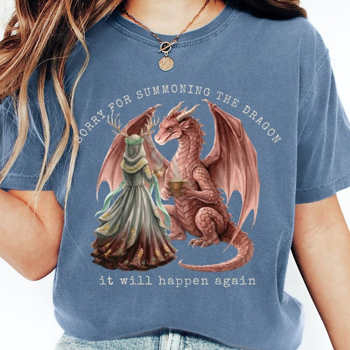 Dragon with a woman in a forest, text says "Sorry for summoning the dragon, it will happen again".