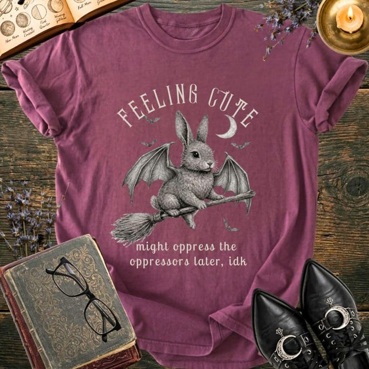 Bunny with wings on broom, "Feeling cute might oppress the oppressors later, idk".