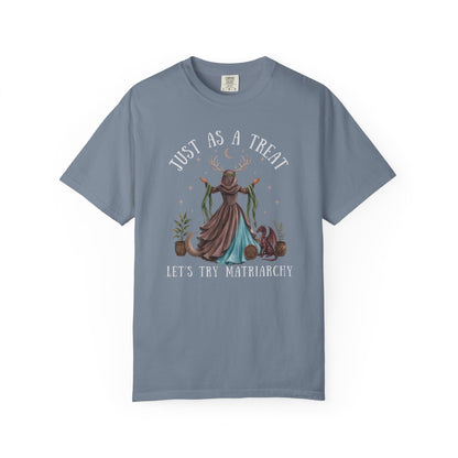 T-shirt with "Just as a treat, let's try matriarchy" text and a dragon and woman illustration.