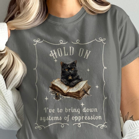 Hold On Cat with Book Bring Down Systems T-Shirt