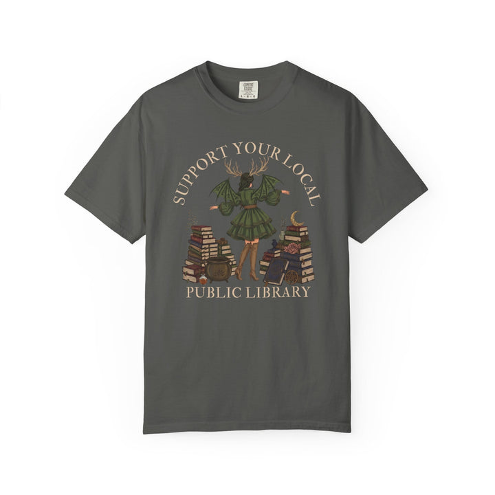 T-shirt graphic with text "Support Your Local Public Library" and mystical elements.