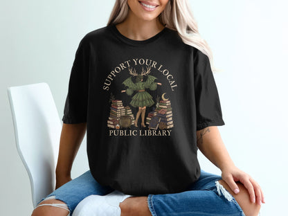 Black t-shirt with "Support Your Local Public Library" and mystical library art.