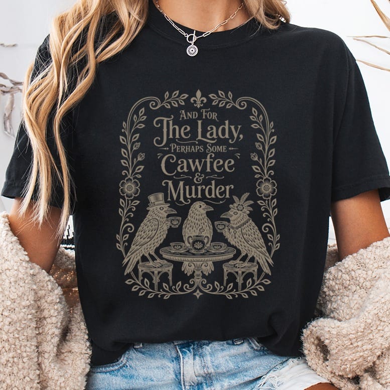 Black t-shirt with "And for the Lady, Perhaps Some Cawfee & Murder" text and three birds.